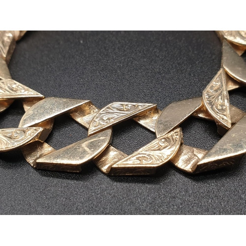 69 - 9ct yellow gold heavy curb bracelet, length 23cm, total weight 43 grams.