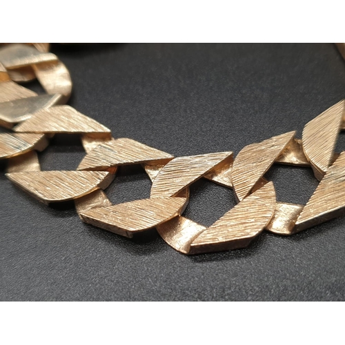 69 - 9ct yellow gold heavy curb bracelet, length 23cm, total weight 43 grams.