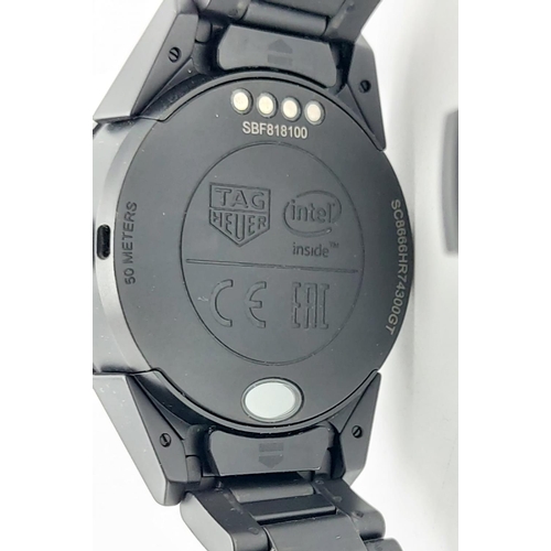 97 - Black TAG Heuer Smartwatch, diameter of face 40mm. length of strap 17cm.