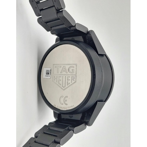 97 - Black TAG Heuer Smartwatch, diameter of face 40mm. length of strap 17cm.