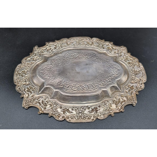 309 - An Antique Burmese Silver Dish. Beautiful embossed animal decoration. 23 x 17.5 cm. 182g