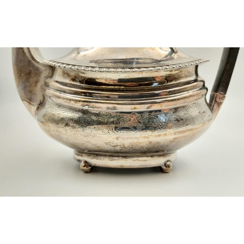 49 - An Antique Silver Daniel and John Wellby Tea Pot.
Hallmarks for London 1904. 21cm tall. Note! The li... 