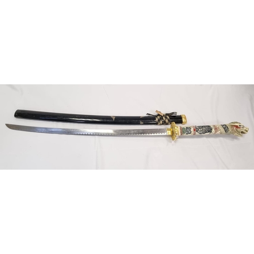 134 - An Ancient Warrior White Dragon Ninja Bushido Katana.
Decorative handle with black scabbard. Length ... 