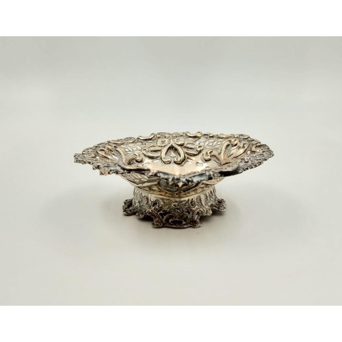 186 - An Antique Silver Embossed and Pierced Small Dish. Marks for Birmingham 1895. 35.6g. 8 x 9cm