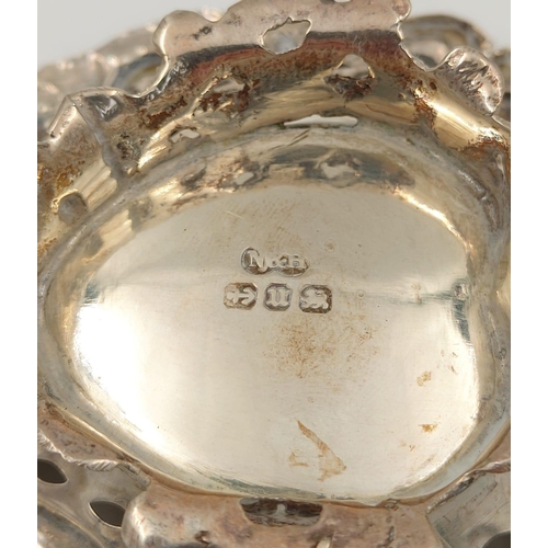 186 - An Antique Silver Embossed and Pierced Small Dish. Marks for Birmingham 1895. 35.6g. 8 x 9cm