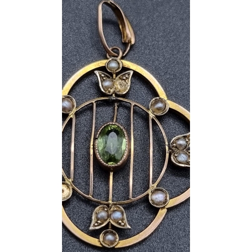 355 - A Vintage 9K Yellow Gold Brooch with Seed Pearls and a Peridot Centre Stone. 3 x 3cm. 2.84g