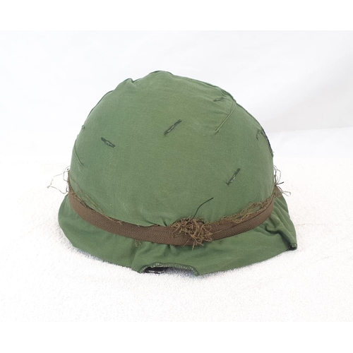 288 - Vietnam War Era US M1 Helmet, with a 3 rd Battalion 144 th Infantry (Texas) OD Helmet Cover.