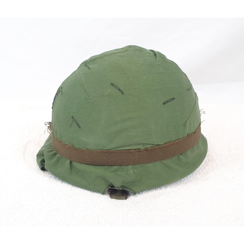 288 - Vietnam War Era US M1 Helmet, with a 3 rd Battalion 144 th Infantry (Texas) OD Helmet Cover.