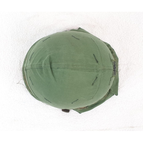 288 - Vietnam War Era US M1 Helmet, with a 3 rd Battalion 144 th Infantry (Texas) OD Helmet Cover.