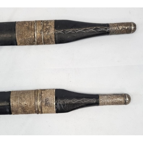 366 - A Pair of Antique Middle-Eastern Practice Broad Swords. We are assuming they are practice swords bec... 