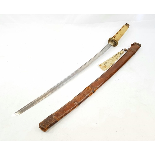 12 - WW2 Japanese Officers Sword. Nice “Hamon” family blade with good markings on the tang. Hand written
... 