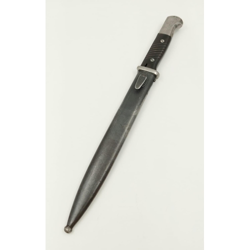 202 - A WW2 Clemen and Jung 1939 K98 Bayonet and Scabbard. Good condition. Length of blade - 24cm.