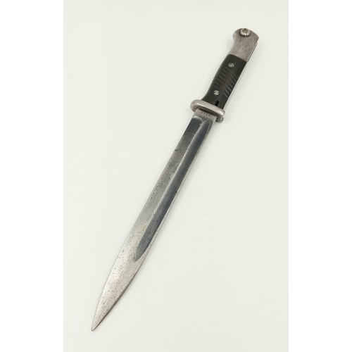 202 - A WW2 Clemen and Jung 1939 K98 Bayonet and Scabbard. Good condition. Length of blade - 24cm.