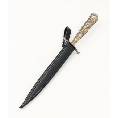 326 - An Interesting Vintage J.Nowill and Sons Dagger. The blade has been married with a silver decorative... 