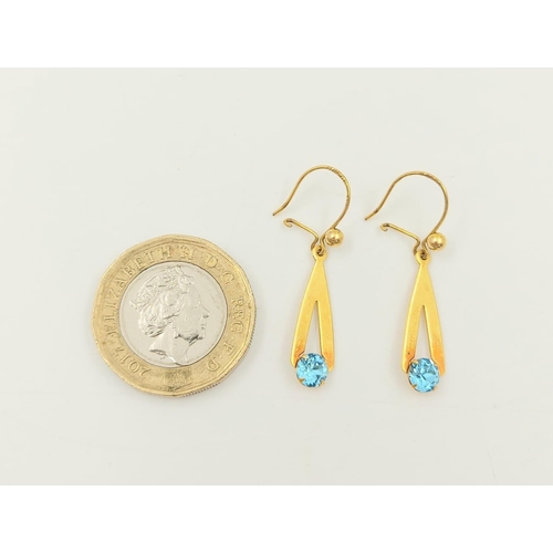 387 - A Pair of 9K Yellow Gold and Aquamarine Earrings.
1.3g