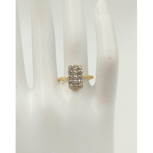 190 - A Beautiful Vintage 18K Yellow Gold Rectangular Diamond Ring. 15 Diamonds in total. Size Q. 2.9g
.5c... 