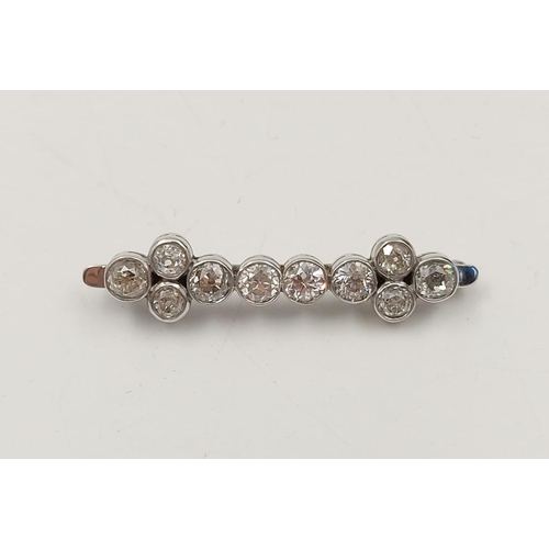 35 - Vintage Platinum Diamond Brooch-10 Carats Each ½ carat, Clarity S2- Total Carats 5. Gross Weight 8.0... 