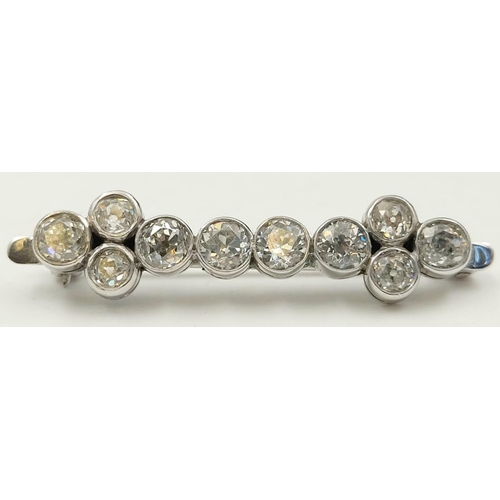 35 - Vintage Platinum Diamond Brooch-10 Carats Each ½ carat, Clarity S2- Total Carats 5. Gross Weight 8.0... 