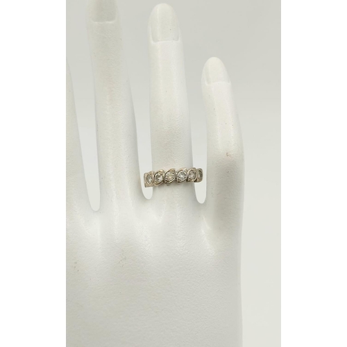 352 - An 18K Yellow Gold Seven-Stone Diamond Ring. Size M
3.7g