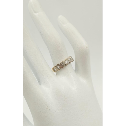 352 - An 18K Yellow Gold Seven-Stone Diamond Ring. Size M
3.7g