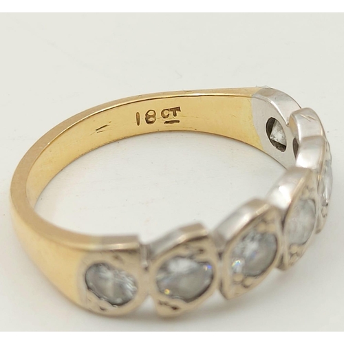 352 - An 18K Yellow Gold Seven-Stone Diamond Ring. Size M
3.7g