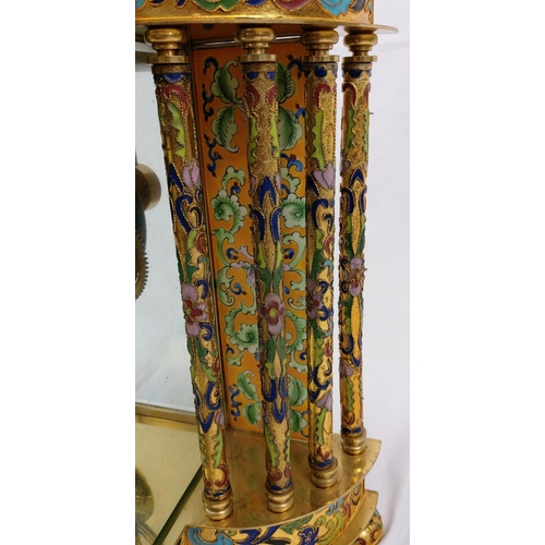 333 - A Reproduction French-Style Enamel and Brass Mantel
Clock. 34 x 45cm. A/F