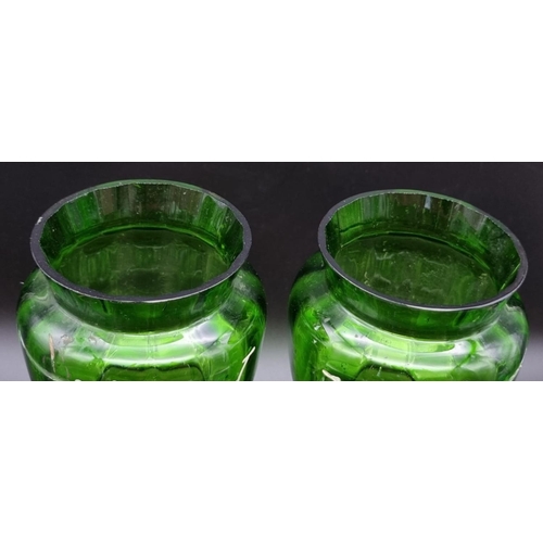 197 - A Pair of Victorian Green Glass Mary Gregory Vases.
27cm tall. Good condition but A/F.