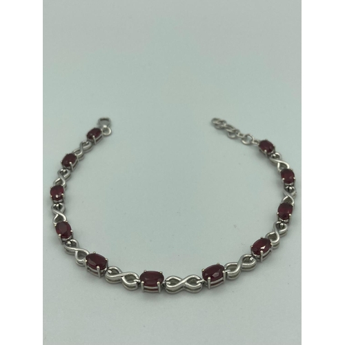 125 - RUBY set SILVER BRACELET  having certificate of authenticity and original protective soft pouch.
8” ... 