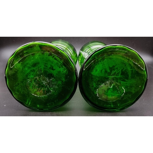 197 - A Pair of Victorian Green Glass Mary Gregory Vases.
27cm tall. Good condition but A/F.