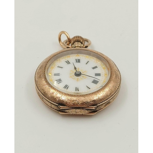 30 - An Antique 9K Yellow Gold Miniature Pocket Watch.
30mm - engraved case. White dial with gilt decorat... 