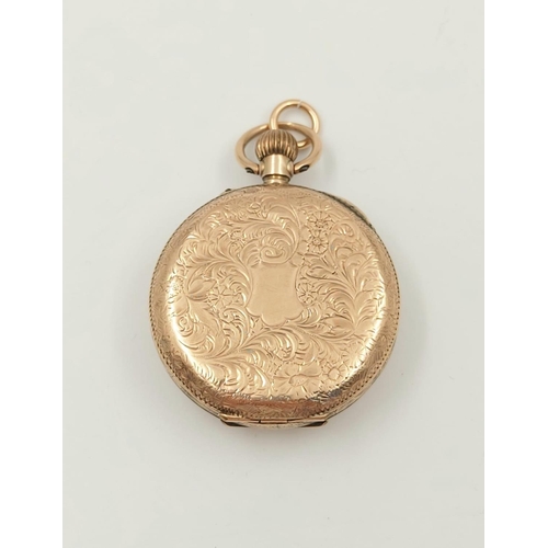 30 - An Antique 9K Yellow Gold Miniature Pocket Watch.
30mm - engraved case. White dial with gilt decorat... 