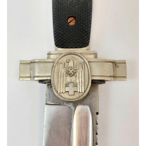 65 - 3 rd Reich D.R.K (German Red Cross) Enlisted Mans Dagger with leather frog.