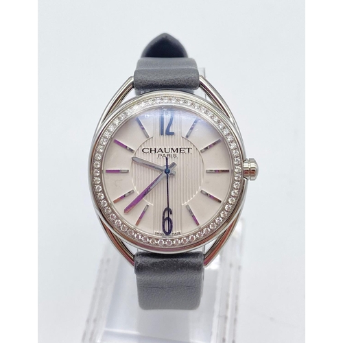 52 - A CHAUMET OF PARIS LADIES WATCH IN STAINLESS STEEL FACTORY SET WITH DIAMOND BEZEL ON ORIGINAL GREY L... 