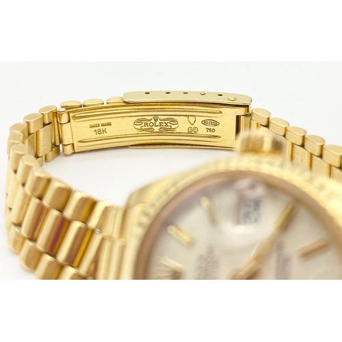 59 - AN 18K GOLD LADIES ROLEX OYSTER PERPETUAL DATEJUST WITH ATTRACTIVE WHITE FACE AND SOLID GOLD STRAP. ... 