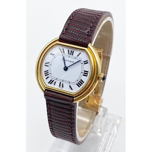 73 - A CARTIER 18K ROSE GOLD CIRCULAR WATCH WITH ROMAN NUMERALS AND LEATHER AND GOLD STRAP.  32mm