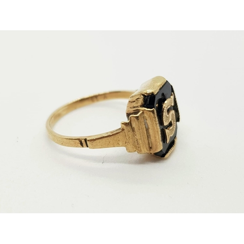 193 - 9k yellow gold and onyx set signet ring with the initial S, ring size J, weighs 2 grams.