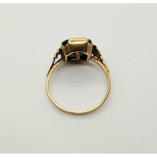 193 - 9k yellow gold and onyx set signet ring with the initial S, ring size J, weighs 2 grams.