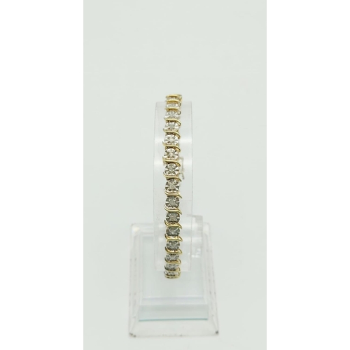 219 - 9k yellow gold and diamond set bracelet, 0.50ct of diamonds, 18cm in length, weight 6.5 grams