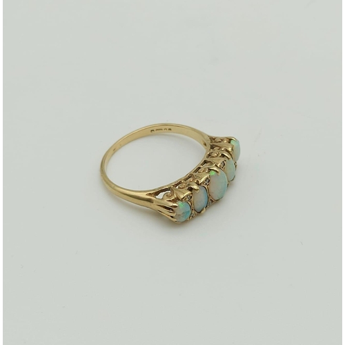 23 - A Beautiful 9K Yellow Gold Five-Stone Opal Ring. Size N.
2.35g