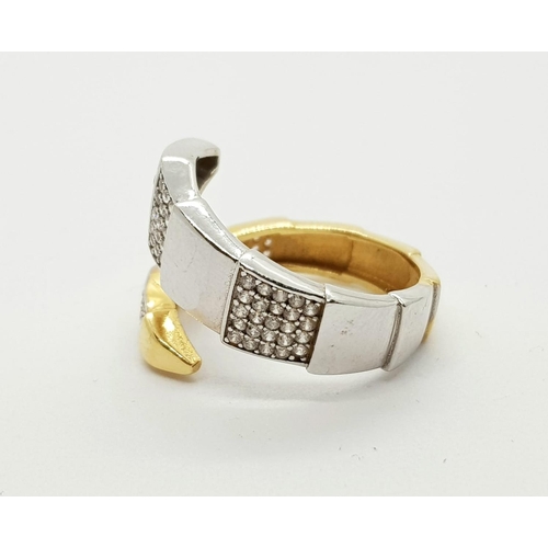 25 - 18k 2 colour gold and white stone set snake ring, weighs 5.5 grams, ring size O