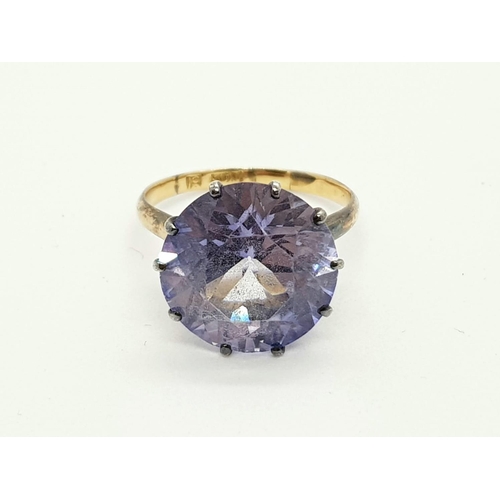 365 - 12k yellow gold iolite set solitaire ring, weighs 4.6 grams, ring size N 1/2.