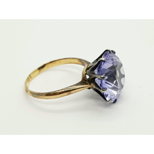 365 - 12k yellow gold iolite set solitaire ring, weighs 4.6 grams, ring size N 1/2.