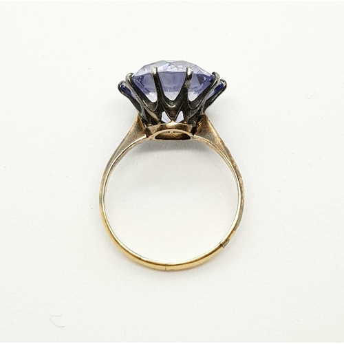 365 - 12k yellow gold iolite set solitaire ring, weighs 4.6 grams, ring size N 1/2.