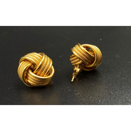 39 - A pair of 9k yellow gold twist knot earrings, weighs 4.8 grams