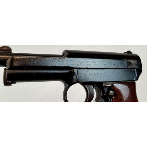 60 - A Mauser (.32 calibre) 7.65 Semi-Automatic Pistol. Circa 1934, walnut grip, factory markings to side... 