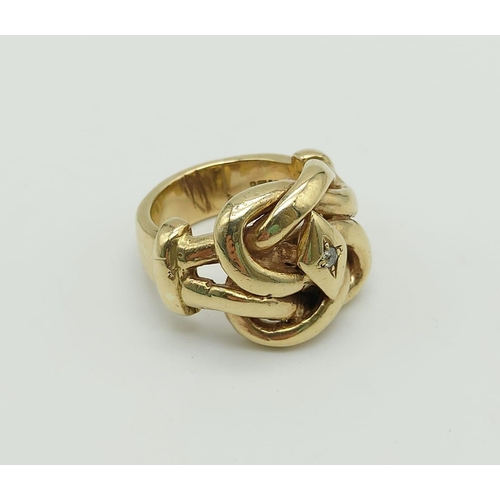 61 - 9k yellow gold heavy knot ring with diamond set to centre, weighs 34.4 grams, ring size Y