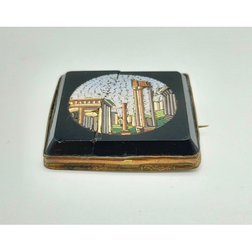 363 - A Victorian Yellow Metal, Micro-Mosaic Brooch
Depicting Classical Roman Ruins. A/F