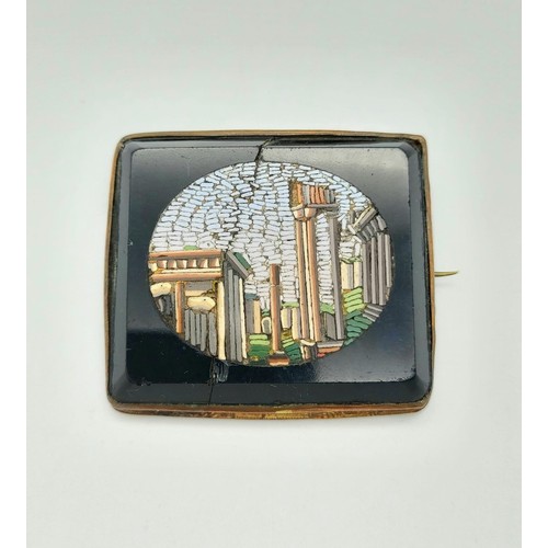 363 - A Victorian Yellow Metal, Micro-Mosaic Brooch
Depicting Classical Roman Ruins. A/F