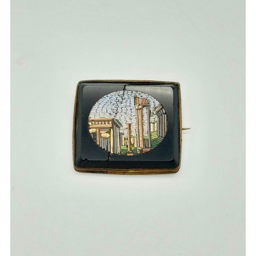 363 - A Victorian Yellow Metal, Micro-Mosaic Brooch
Depicting Classical Roman Ruins. A/F