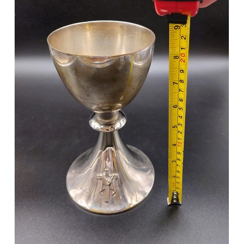 370 - An Early White Metal Chalice with a Silver Cross.
20cm tall. 10cm diameter at mouth. 595g